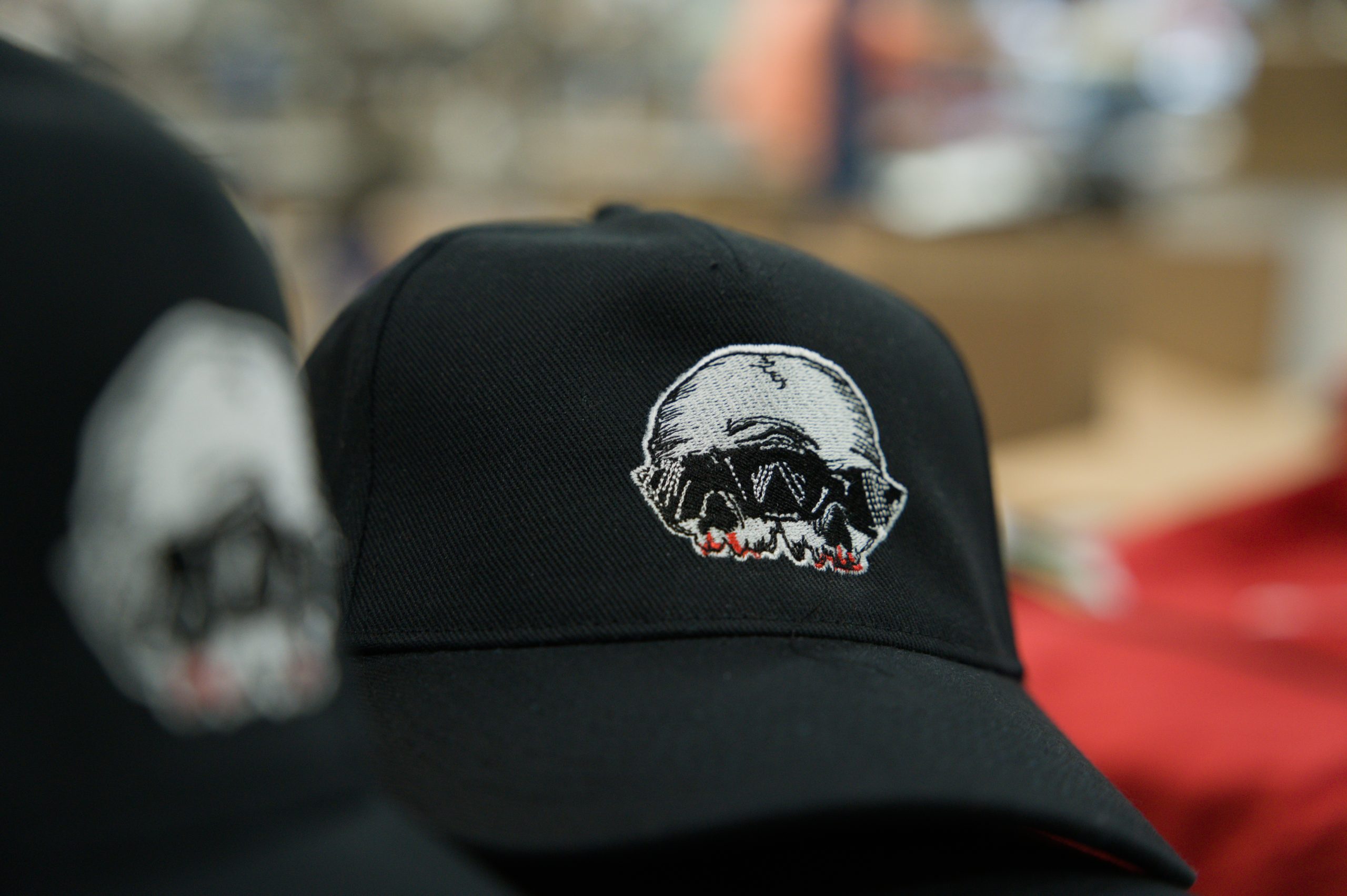 Embroidered baseball caps with company logos stitched at Textile Print in Limerick
